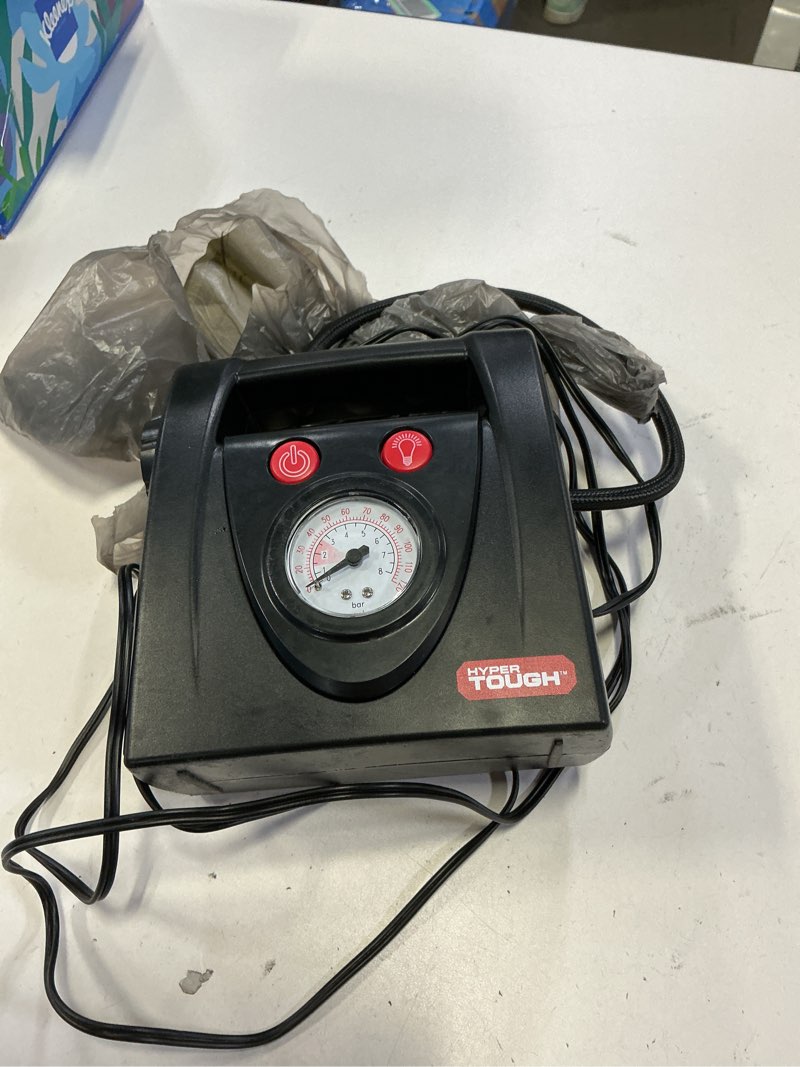 Condition photo showing As Is for hyper tough dc12v standard tire inflator & tire pump