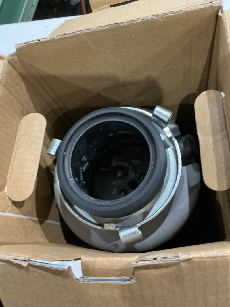 Condition photo showing As Is for turbogrind 1/2 hp. continuous feed garbage disposal with power cord