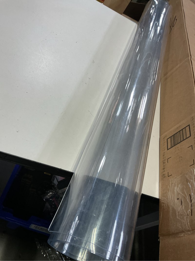 Condition photo showing As Is for necaux custom multi-size 1.5mm thick clear pvc table cover protector - 24 x 60 inch water resistant plastic rectangular vinyl non-slip desk pad for 5 foot coffee table/writing desk 24" x 60" clear 1.5mm