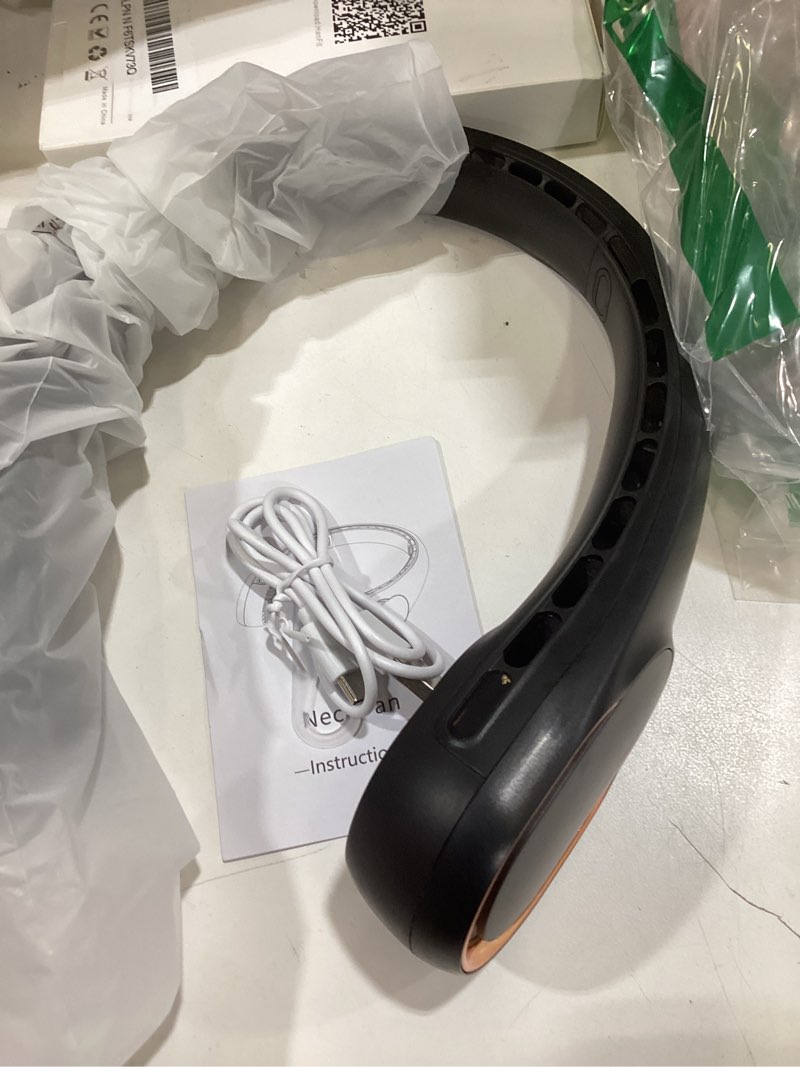 Condition photo showing Good Condition for asnug neck fan, bladeless neck fan, 4000 mah rechargeable personal fan, 360° hands free wearable fan, 3 speeds adjustable,faster cooling, ultra quiet, suitable for home, office, travel, sports black