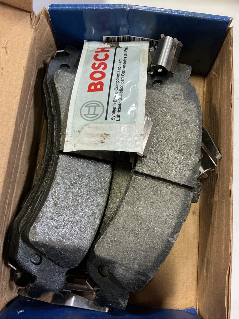 Condition photo showing As Is for bosch be834h blue ceramic disc brake pad set with hardware - compatible with select cadillac escalade; chevrolet avalanche, silverado, suburban, tahoe; gmc sierra, yukon, yukon xl + more; rear