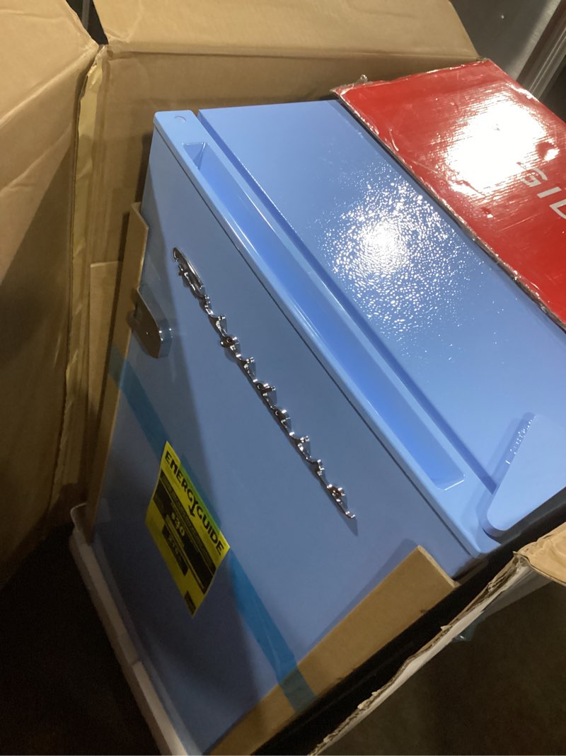 Condition photo showing Good Condition for Frigidaire Retro Compact Fridge with Chiller, 3.2 cu ft Countertop Fridge with Built-In Bottle Opener, Compact Refrigerator for Office, Bedroom, Dorm Room or Cabin - 16.5" D x 19" W x 31" H (Blue)