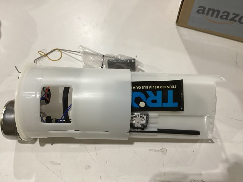 Condition photo showing New/Like New for TRQ Fuel Pump Module Assembly Compatible with 1998-2001 Dodge Ram 1500 1998-2002 Ram 2500 Ram 3500 FPA62003