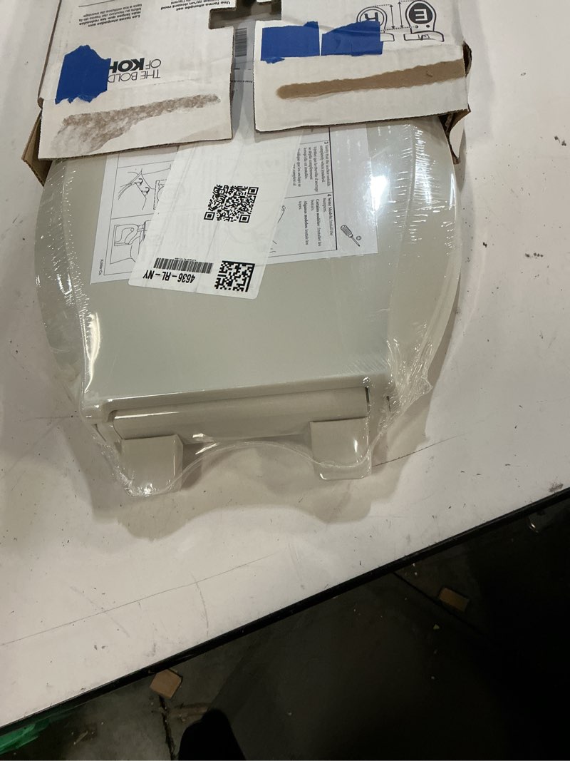 Condition photo showing New/Like New for kohler 4636-rl-ny cachet readylatch elongated toilet seat, quiet-close lid and seat, countoured seat, grip-tight bumpers and installation hardware, dune
