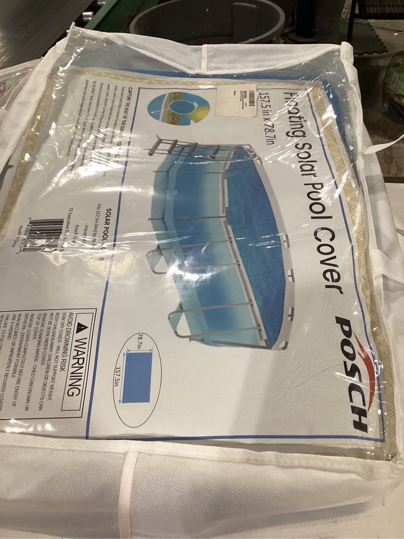 Condition photo showing As Is for swimming pool solar blanket cover blue 10'x10' round