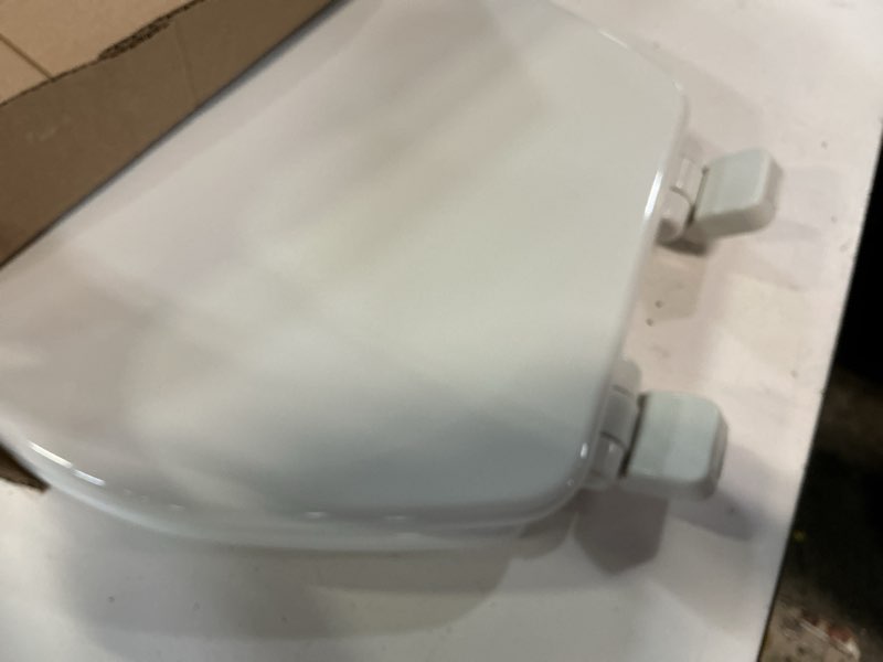 Condition photo showing Good Condition for mayfair linden slow close toilet seat, non slip heavy duty wood, easy install, round, white round traditional hinge