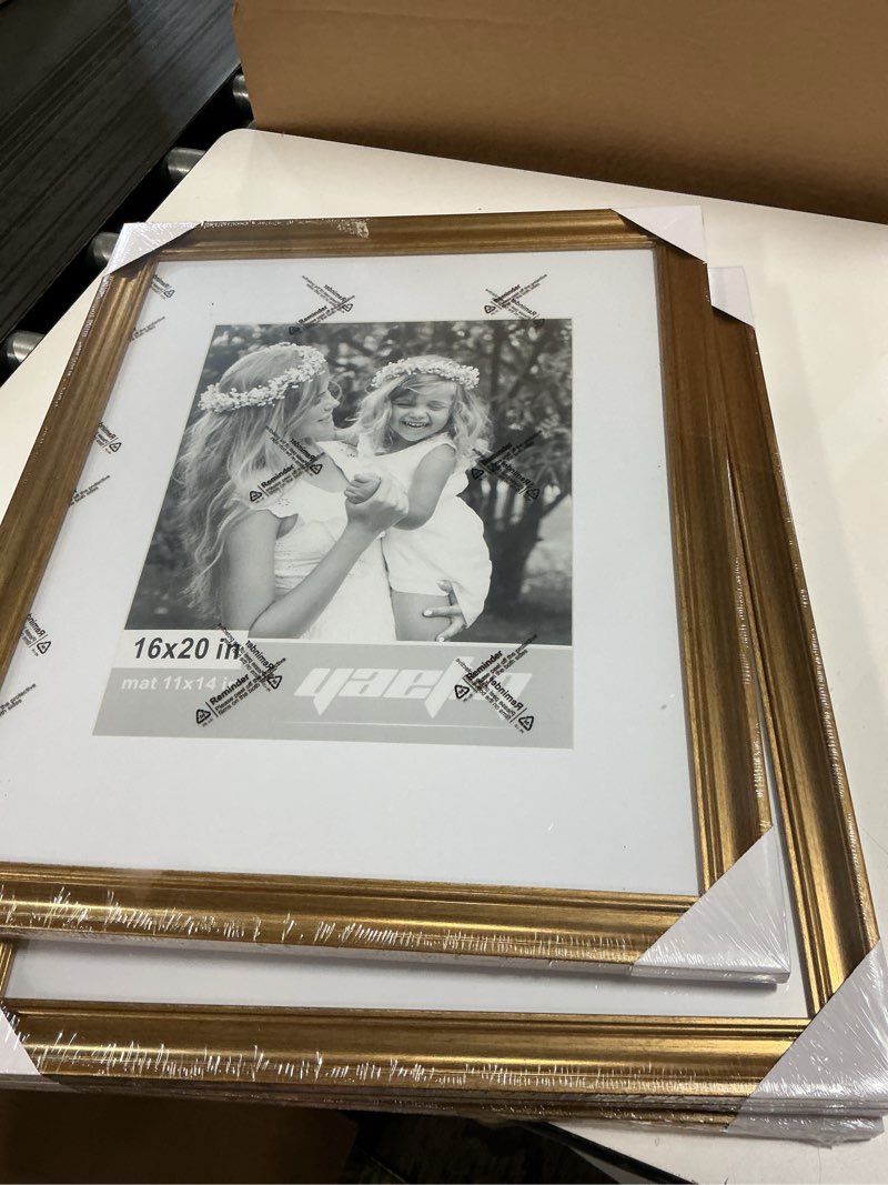 Condition photo showing Good Condition for Yaetm 20x24 Gold Picture Frame Matted to 16x20 Set of 2, 1.4” Wide Molding & Rustic Gold Frames for Wall Gallery, Home and Office, Wall Mounting, 4 Pack