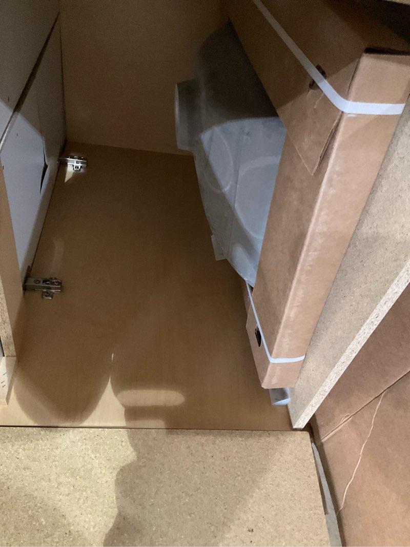 Condition photo showing As Is for project source tierra 24-in sandstone single sink bathroom vanity with top