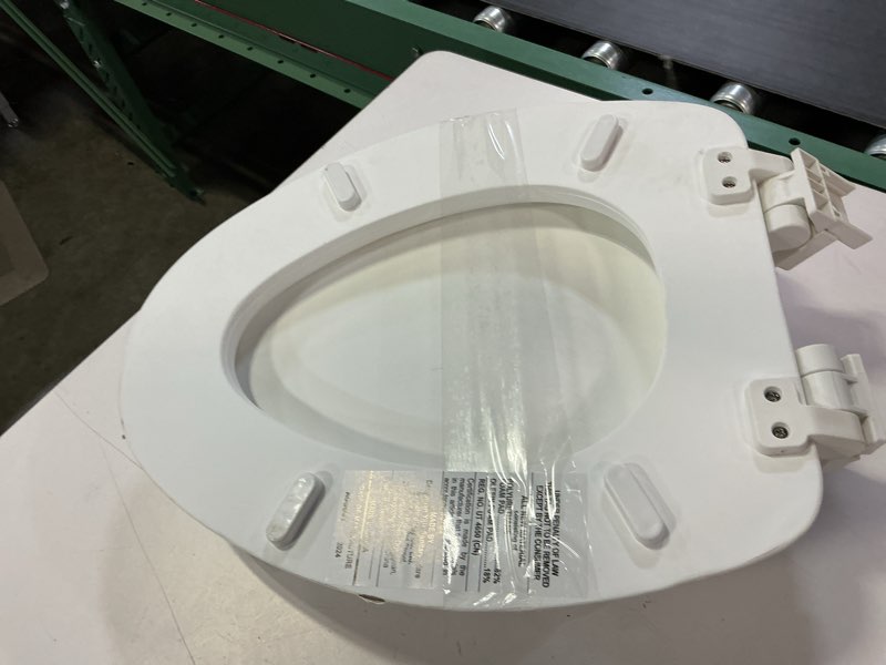 Condition photo showing As Is for mainstays premium 19" soft elongated toilet seat, tpu leather, memory foam, quick-release hinges