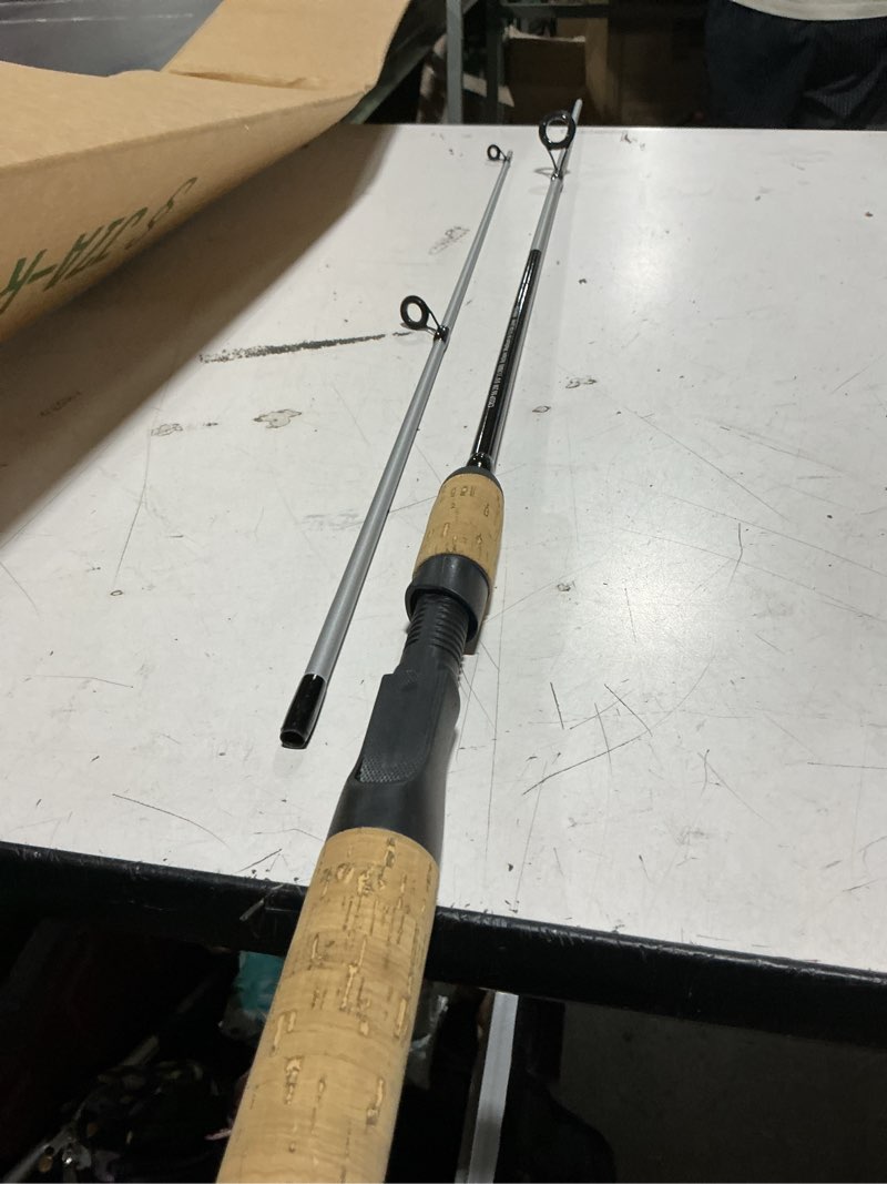 Condition photo showing As Is for shakespeare cirrus 6'6" spinning fishing rod and reel combo, 2-piece graphite rod blank, size 30 spinning reel, pre-spooled with monofilament fishing line