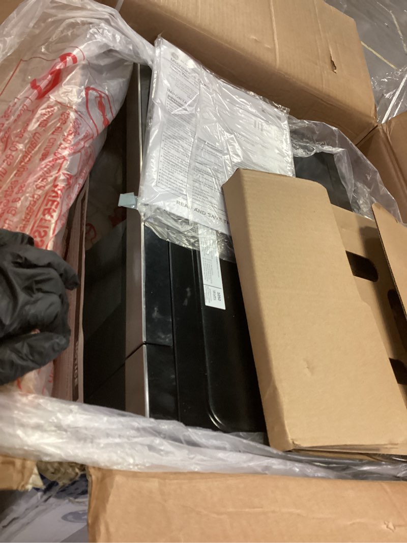 Condition photo showing Good Condition for GE GCST10A1WSS 4-in-1 Microwave Oven, 1,050 Watts Air Fryer, Broiler & Convection Mode, Child-Lock Technology, Kitchen Essentials for The Countertop or Dorm Room, 1.0 Cu. Ft, Stainless Steel