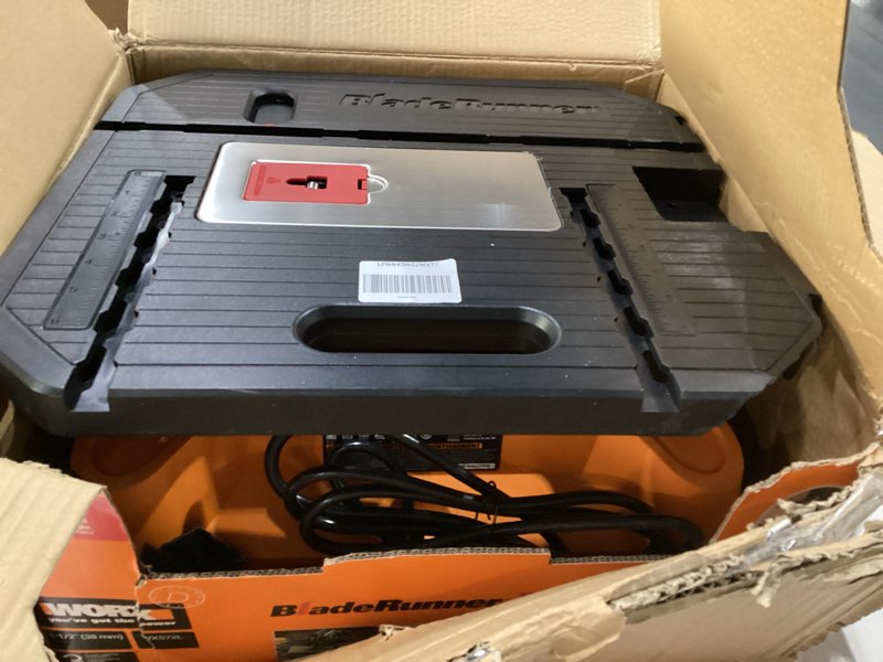 Condition photo showing As Is for Worx WX572L 5.5 Amp BladeRunner Portable Electric Table Top Saw, AS IS
