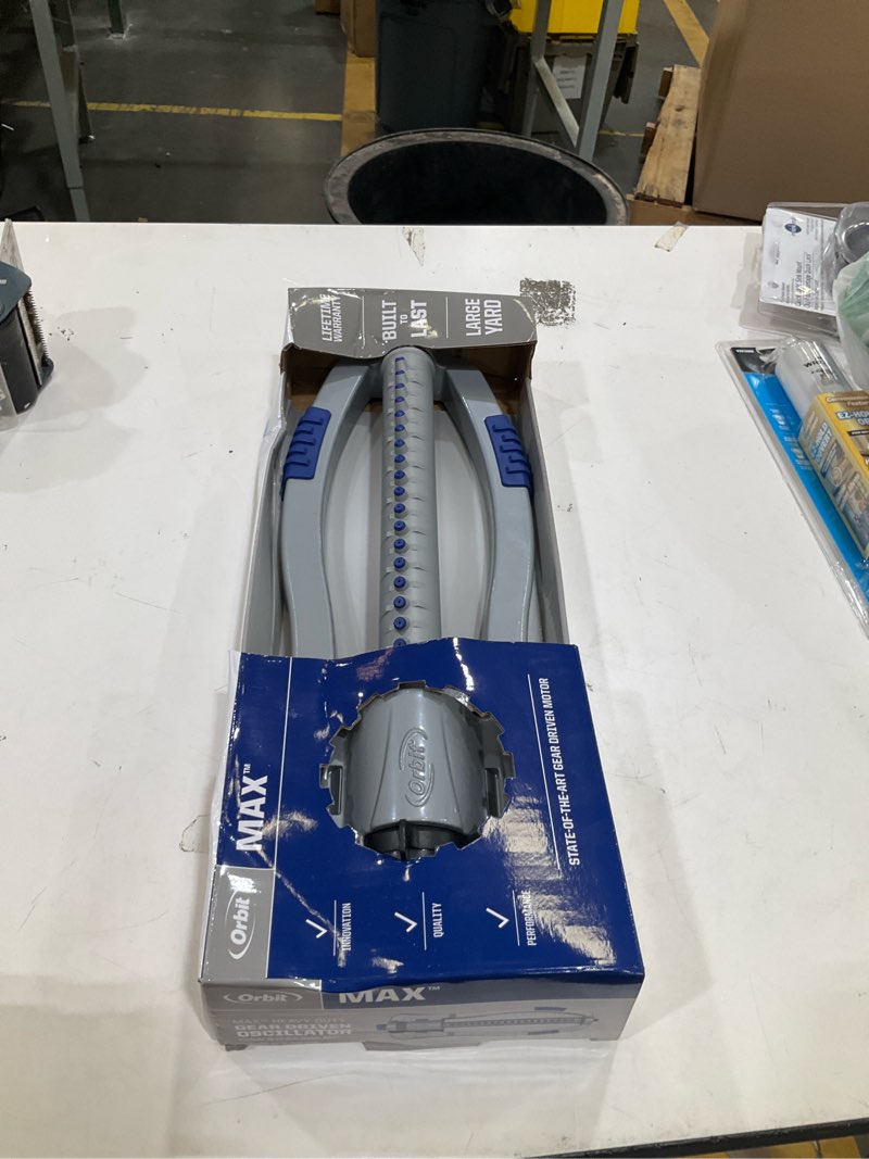 Condition photo showing Good Condition for orbit orbit max 4000-sq ft oscillating sled lawn sprinkler
