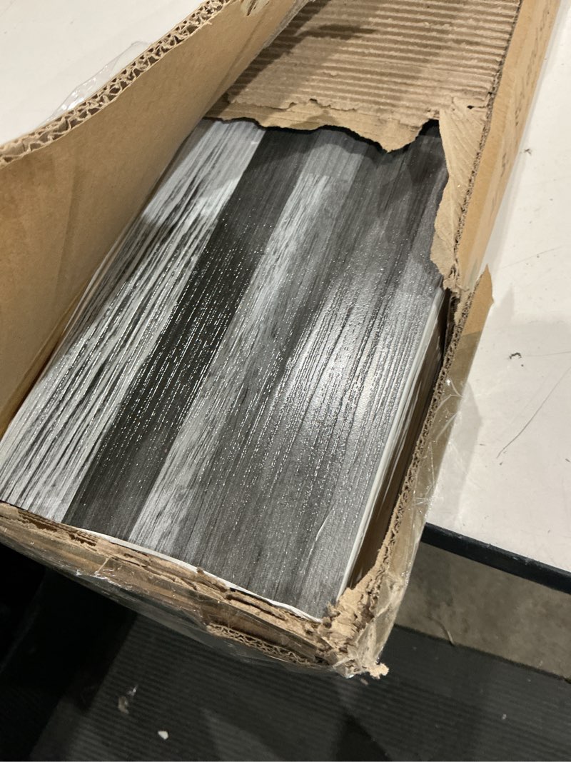 Condition photo showing As Is for art3d 36-pack 54 sq.ft peel and stick floor tiles vinyl plank flooring wood look, adhesive and waterproof tile sticker for bedroom, living room, kitchen, rv in grey gray 36 x 6 x 0.1 inches 36