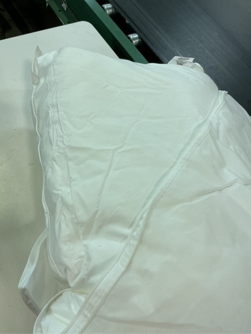Condition photo showing As Is for premium down alternative pillow, standard, medium/firm