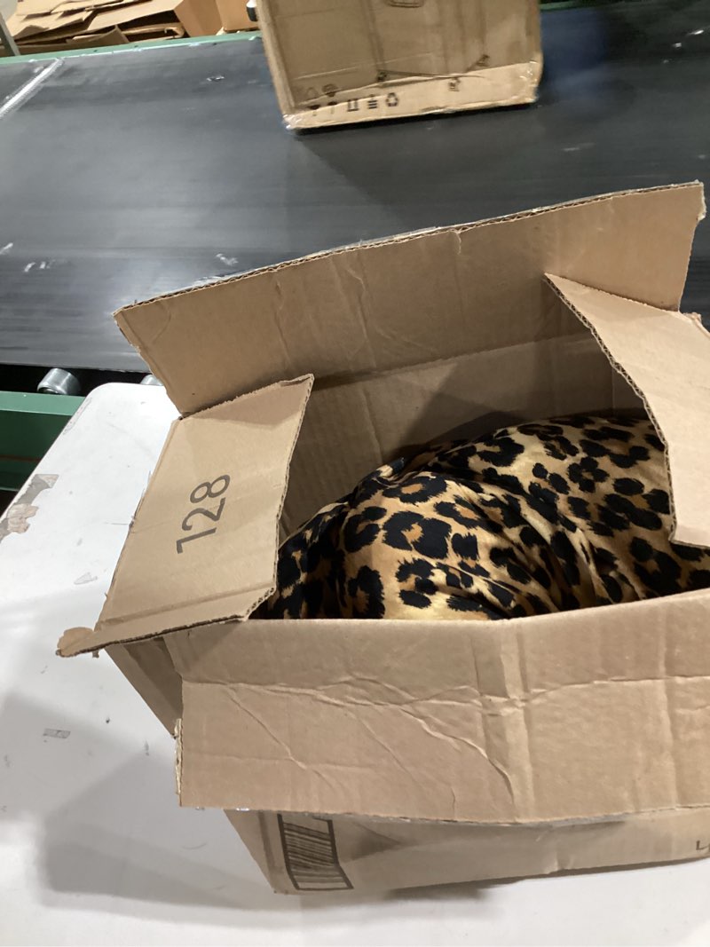Condition photo showing Good Condition for Juicy Couture Bow Shaped 12"x20" Decorative Pillow, Cheetah