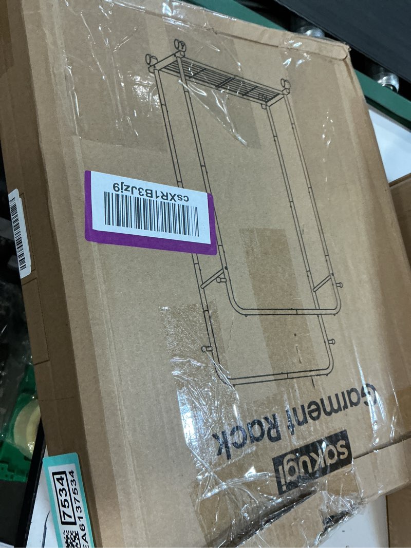 Condition photo showing As Is for Clothes Rack - Double Rods Clothing Rack with Mesh Shelf, Hooks & Wheels, Metal Clothing Racks for Hanging Clothes & Bags, Multifunctional Garment Rack for Laundry, Gold, 28.7" x 16.5" x 59.1" Gold Large 28.7"W x 16.5"D x 59.1"H