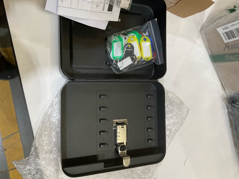 Condition photo showing As Is for KYODOLED 20 Key Storage Lock Box with Code, Key Cabinet Organizer Wall Mount with Combination Lock, Key Hooks & Labels, 7.87 x 6.3 x 3.14 in, Black Black With Combination Lock 20 Key