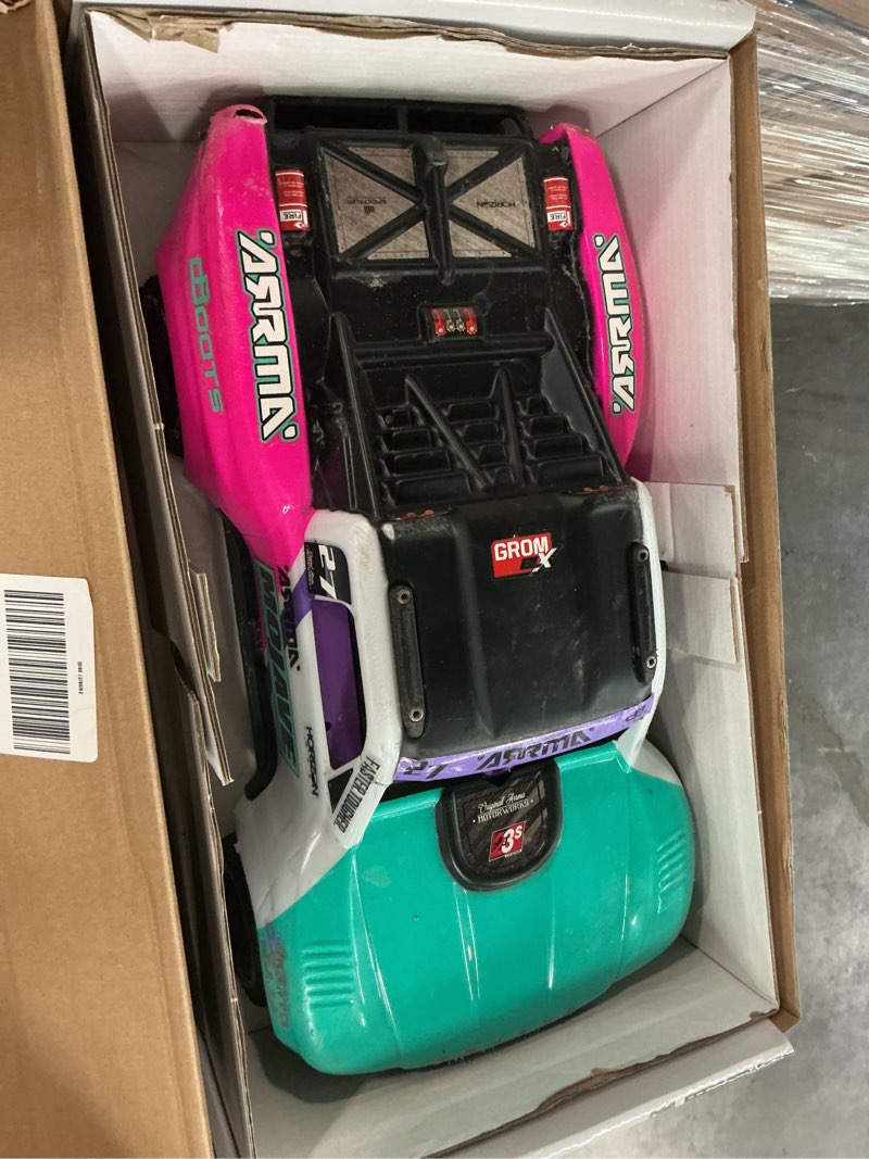 Condition photo showing As Is for arrma rc truck mojave grom 4x4 smart small scale desert truck, rtr (with battery and charger included) red/black ara2104t1
