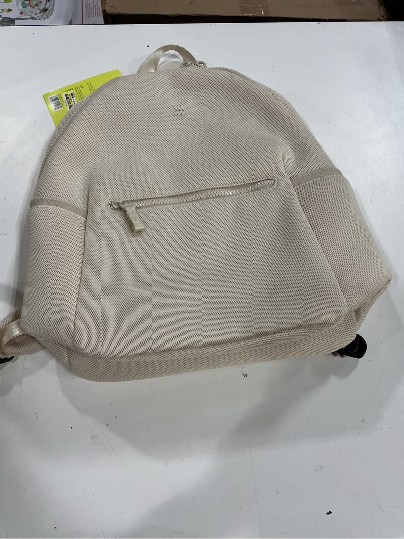 Condition photo showing New/Like New for air mesh backpack - all in motion™ cream