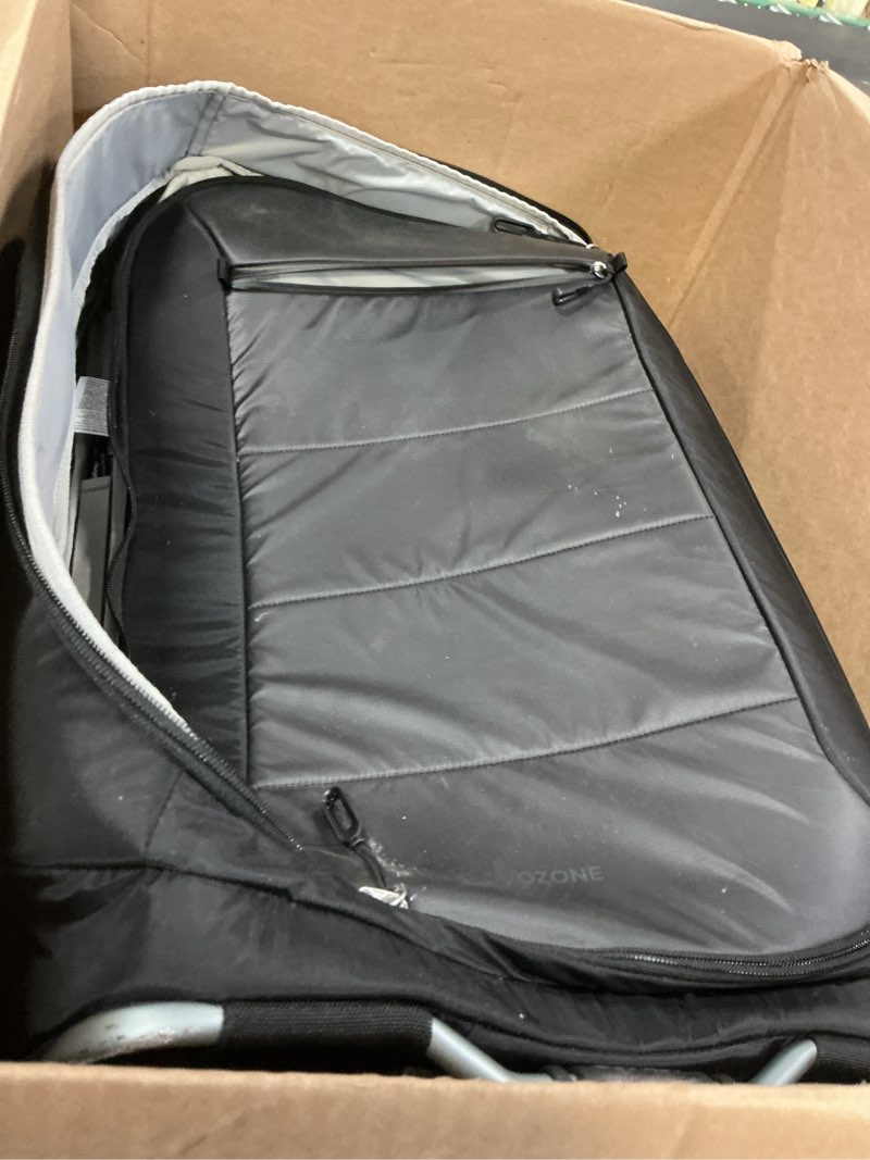 Condition photo showing As Is for Osprey Ozone 2-Wheel 80L/27 Checked Luggage - Lightweight Rolling Bag with High Clearance and Oversized Wheels - Travel Suitcase with Mesh Organization, Trolley Handle and Add-a-Bag Strap, Black