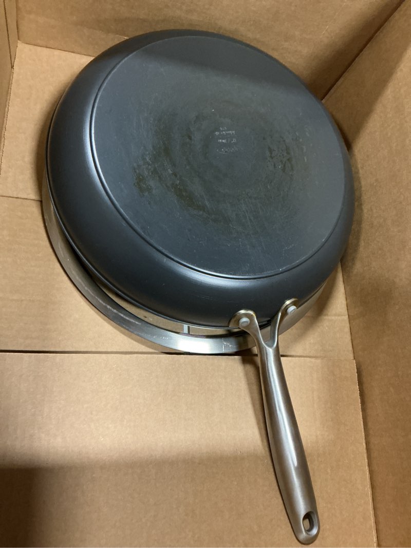 Condition photo showing As Is for OXO Enhanced, 12" Frying Pan Skillet with Lid, Healthy Ceramic Nonstick, PFAS-Free, Stainless Steel Handle, Dishwasher Safe, Oven Safe, Black 12" Frying Pan Skillet with Lid Black