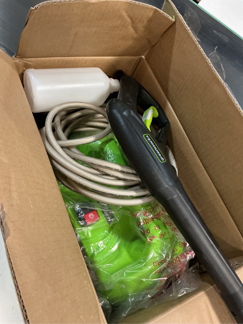 Condition photo showing As Is for greenworks 1800 psi 1.2-gpm cold water electric pressure washer with 2 spray tips