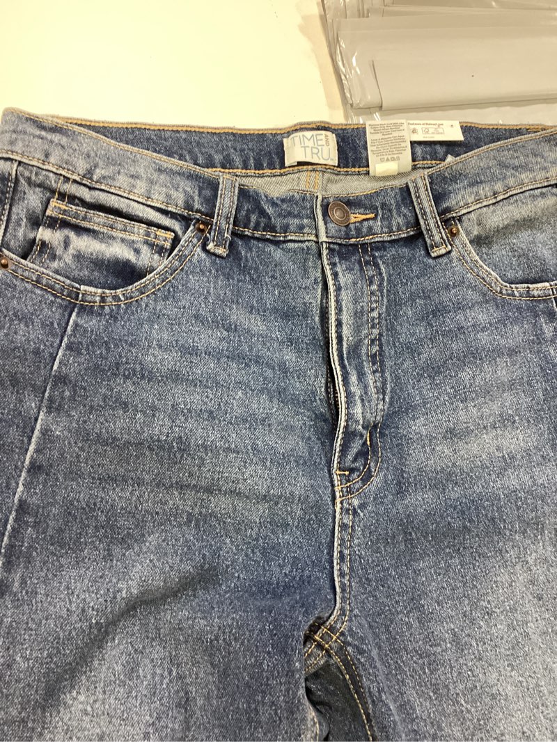 Condition photo showing Good Condition for time and tru barrel leg jean size 10