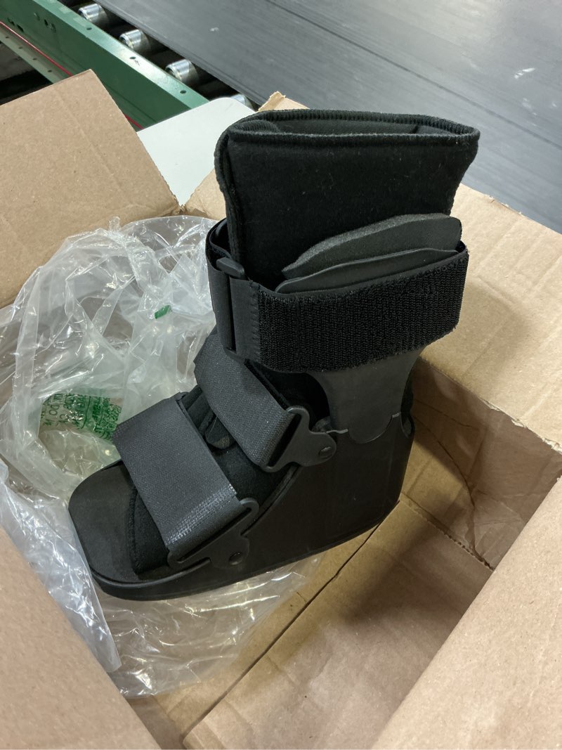 Condition photo showing Good Condition for united ortho short air cam walker fracture boot, small, black black small boot