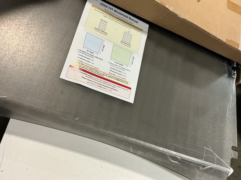 Condition photo showing As Is for 5mm pc golf cart windshield for ezgo txt 2014-up 1" struts hd hinges clear | impact resistant protection, foldable, blocks wind, rain & debris, ideal for golf course, campground & neighborhood use