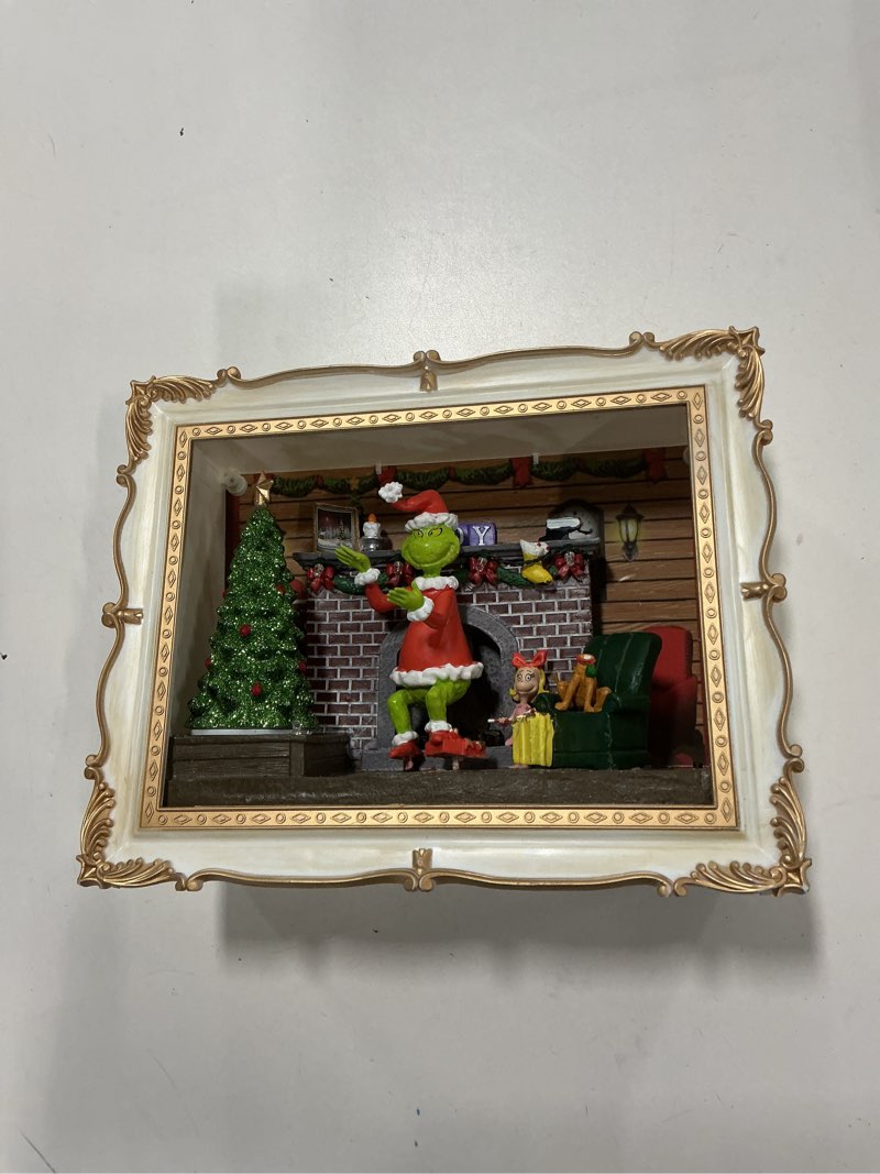 Condition photo showing As Is for DR SEUS GRINCH FRAME SCE 