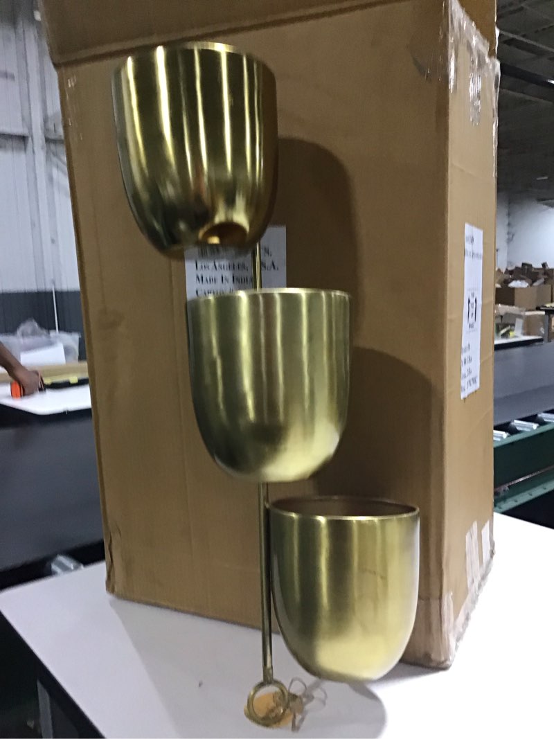 The Novogratz 12  x 12  x 25  Round Gold Metal Indoor Outdoor Layered Wall Planter