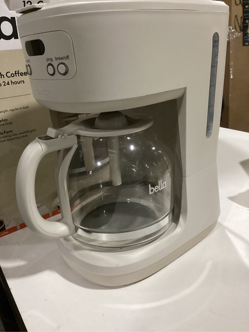 Condition photo showing As Is for BELLA 12 Cup Programmable Coffee Marker, Reusable Dishwasher Safe Accessories, Easy LCD diaply, Auto Shutoff, 900 watt, Oatmilk