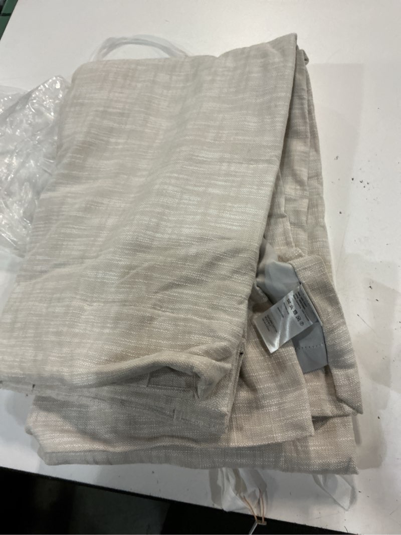 Condition photo showing As Is for textured cotton room darkening curtain 48x84 in