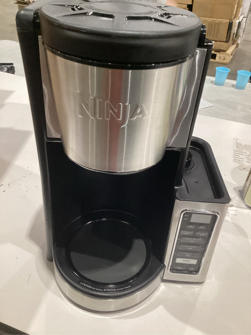 Condition photo showing As Is for ninja 12-cup programmable coffee brewer, 2 brew styles, adjustable warm plate, 60oz water reservoir, delay brew - black/stainless steel