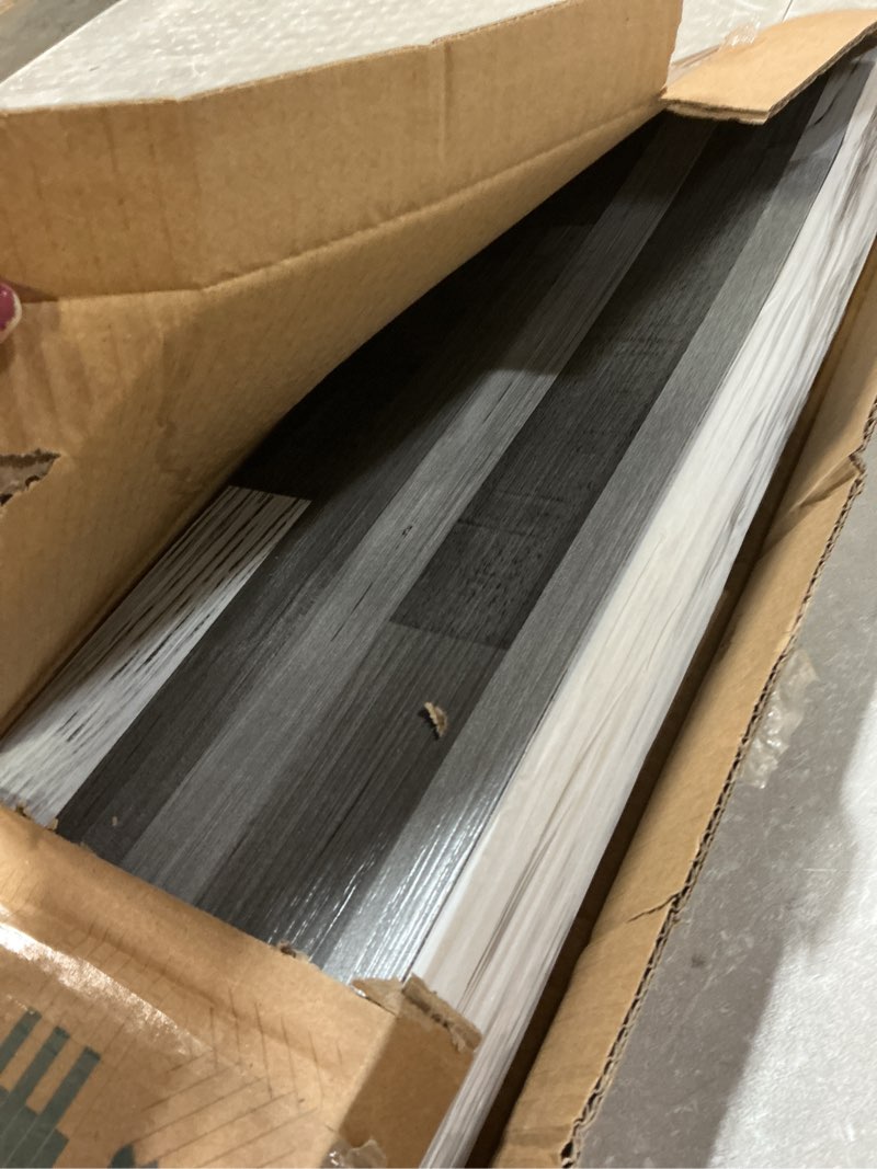 Condition photo showing Good Condition for Art3d 36-Pack 54 Sq.ft Peel and Stick Floor Tiles Vinyl Plank Flooring Wood Look, Adhesive and Waterproof Tile Sticker for Bedroom, Living Room, Kitchen, RV in Grey 36 x 6 x 0.1 inches Grey 36