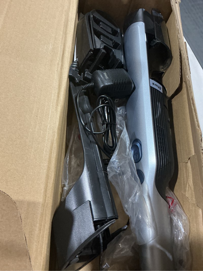 Condition photo showing Good Condition for Shark WV201BLBRN WANDVAC Cordless Hand Vac, Lightweight and Portable at 1.4 lbs. with Powerful Suction, Charging Dock, One-Touch Empty for Car & Home, Cove Blue