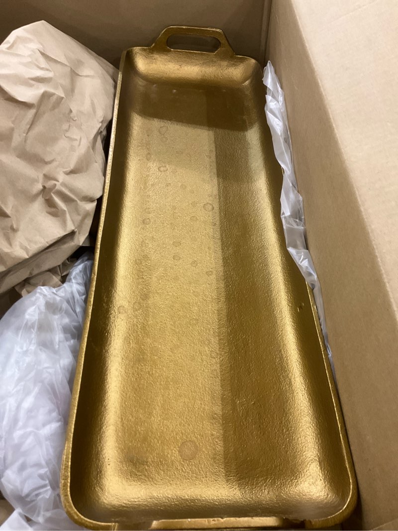 Condition photo showing As Is for Signature Design by Ashley Posy Contemporary Decorative Metal Serving Tray with Handles, Display Only, Not Food Safe, Cast Aluminum, 24" Length, Gold Finish