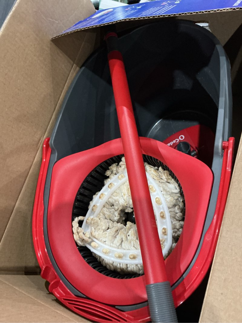 Condition photo showing As Is for o-cedar easywring 12 in. w spin mop with bucket