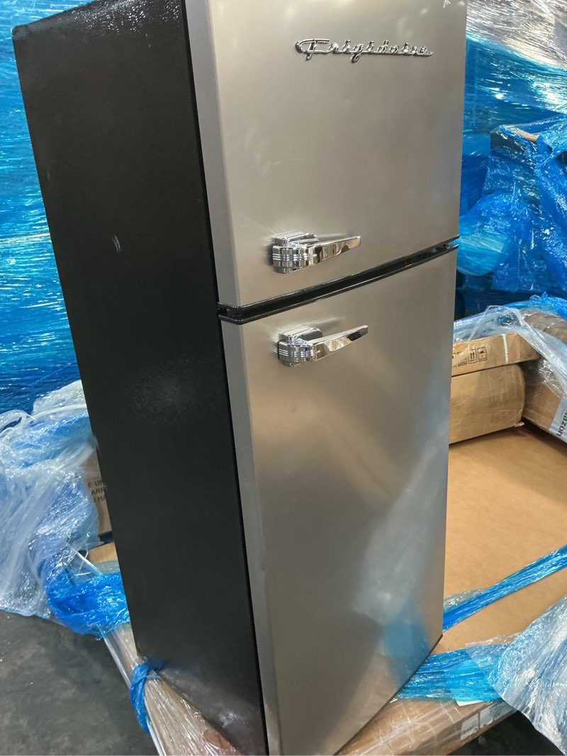 Condition photo showing As Is for frigidaire efr753, 2 door apartment size refrigerator with freezer, retro chrome handle, 7.5 cu ft, platinum series, stainless steel, 7.5 silver double door fridge
