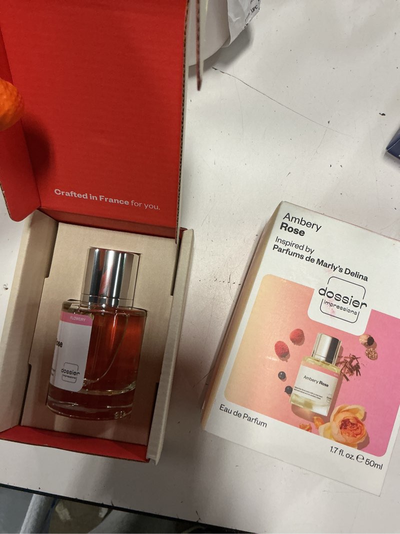 Condition photo showing New/Like New for dossier - eau de parfum - ambery rose - feminine - 1.7oz (50ml)