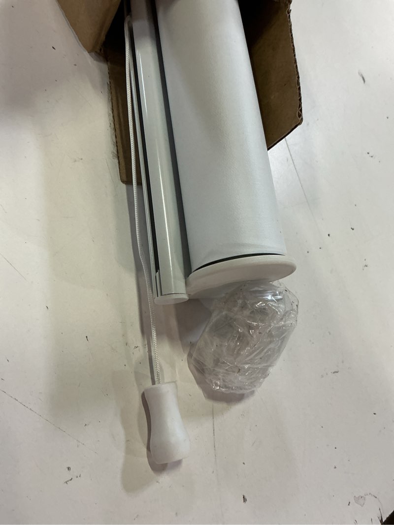 Condition photo showing Good Condition for chicology cordless roller shades blackout window blinds, snap-n-glide smooth lift system, thermal insulated uv protection, easy install for bedroom living room sliding door, byssus white, 32"w x 72"h byssus white 32"w x 72"h