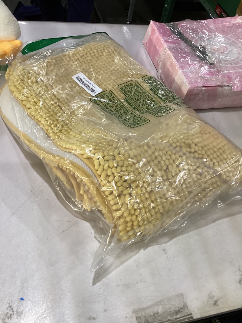 Condition photo showing Good Condition for OLANLY Bathroom Rugs 36x24, Extra Soft Absorbent Chenille Bath Rugs, Rubber Backing Quick Dry, Machine Washable Bath Mats for Bathroom Floor, Tub and Shower, Home Decor Accessories, Yellow Yellow 36" x 24"