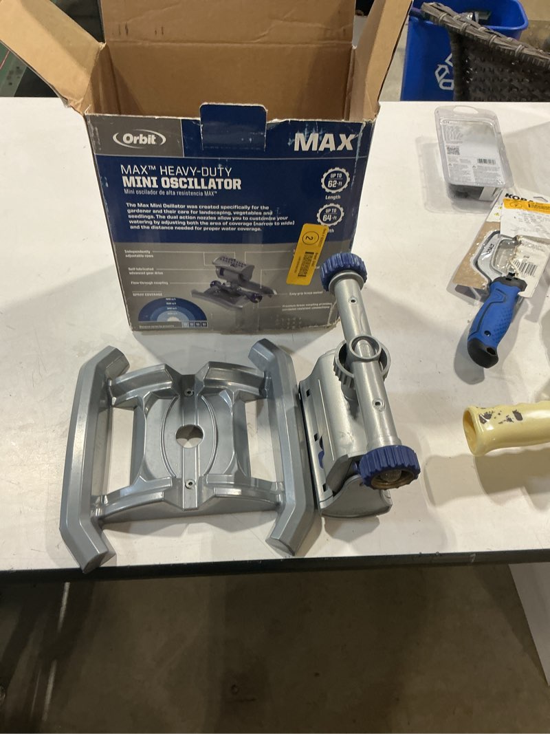 Condition photo showing As Is for orbit max 3900-sq ft oscillating sled lawn sprinkler