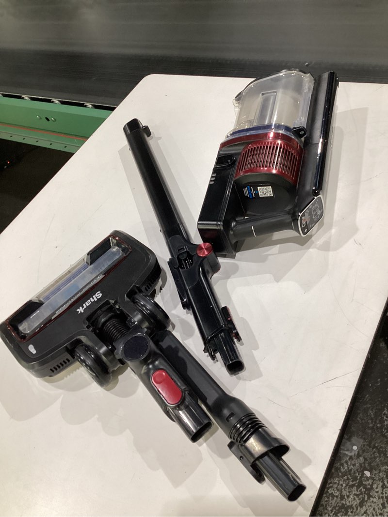 Condition photo showing As Is for (USED, NOT TESTED) Shark Cordless Vertex Pro Lightweight Cordless Stick Vacuum with DuoClean PowerFins, HEPA Fitler, Anti-Allergen Complete Seal, LED Headlights, For Carpets & Hardfloors, Red, IZ662H Vertex FlexPro w/ PowerDisplay(60 min)