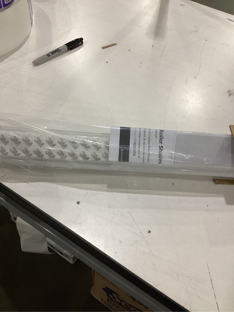 Condition photo showing As Is for LazBlinds No Tools No Drill Cordless Roller Shades, 100% Blackout Blinds for Windows, Thermal Insulated UV Protection Roll Up Blinds for Windows, 42" W x 72" H, White White 42" W x 72" H