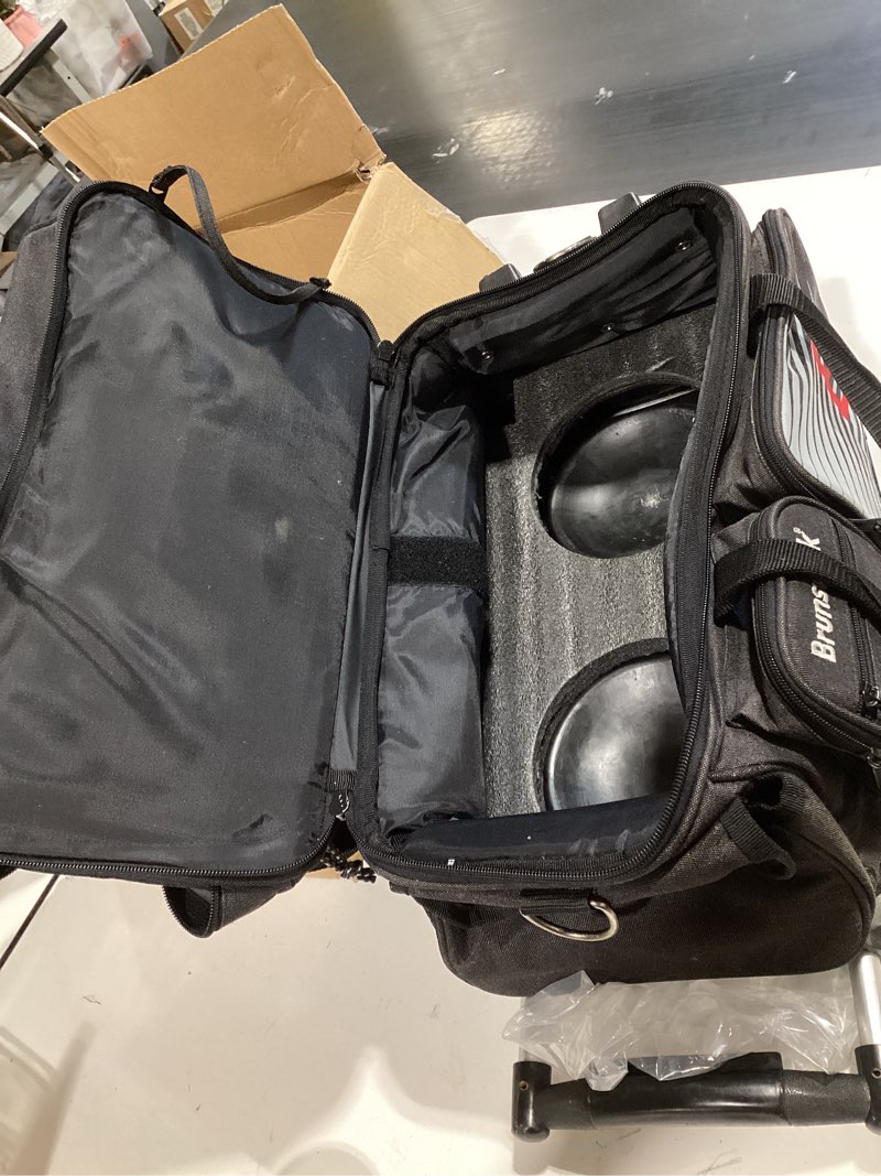 Condition photo showing Good Condition for gohimal double roller 2 ball bowling bag with separate shoe compartment for bowling shoes (up to us mens size 15) and oversized accessory pocket, retractable handle - extends to 40" black