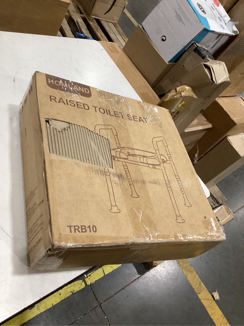Condition photo showing As Is for this product is a homland raised toilet seat, specifically model trb10, designed to assist seniors and individuals with mobility challenges [5.4, 5.5].