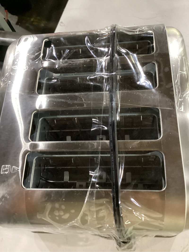 Condition photo showing Good Condition for cuisinart toaster, extra-wide slots, stainless steel, 4-slice | bagel, pastry & bread toaster with defrost/reheat functions, 6-setting browning dials & a slide-out crumb tray, cpt-180p1