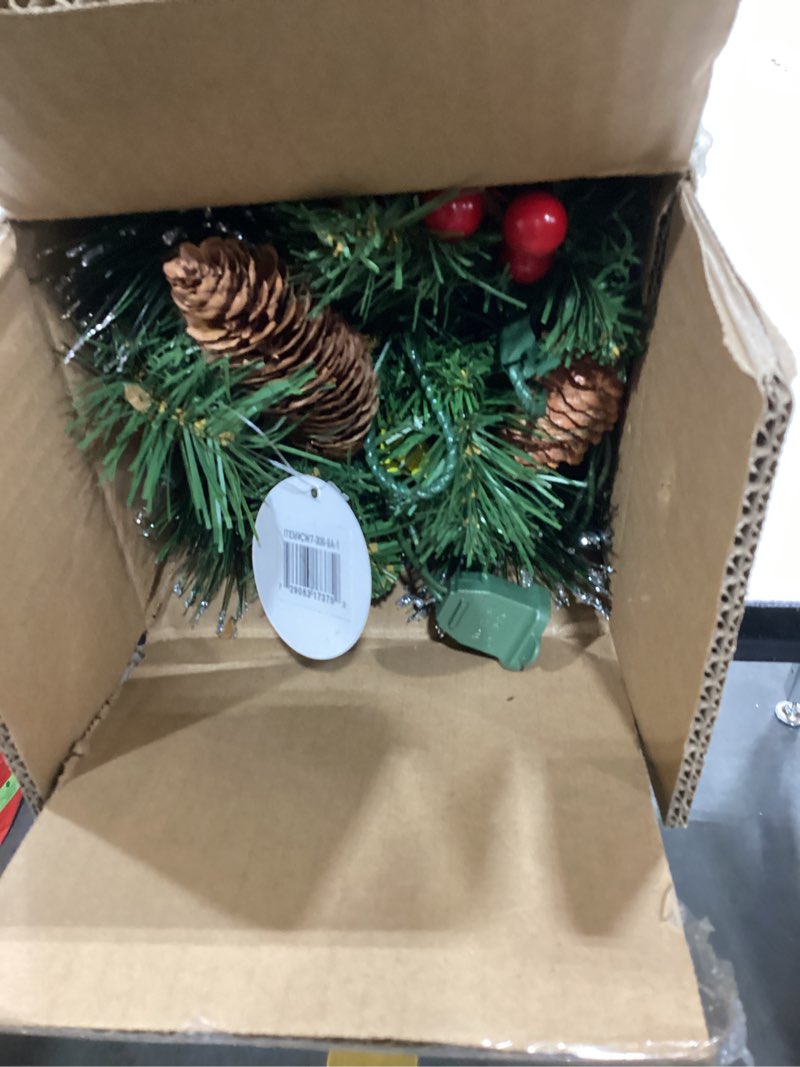 Condition photo showing Good Condition for national tree company 9 ft pre-lit crestwood spruce artificial christmas garland, christmas decoration with glitter, pinecones, red berries, 50 clear lights, 180 tips, green plug in tree
